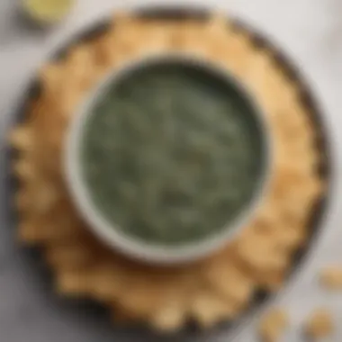 Creamy spinach dip served with crackers