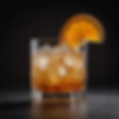 Close-up of an Old Fashioned cocktail garnished with an orange twist