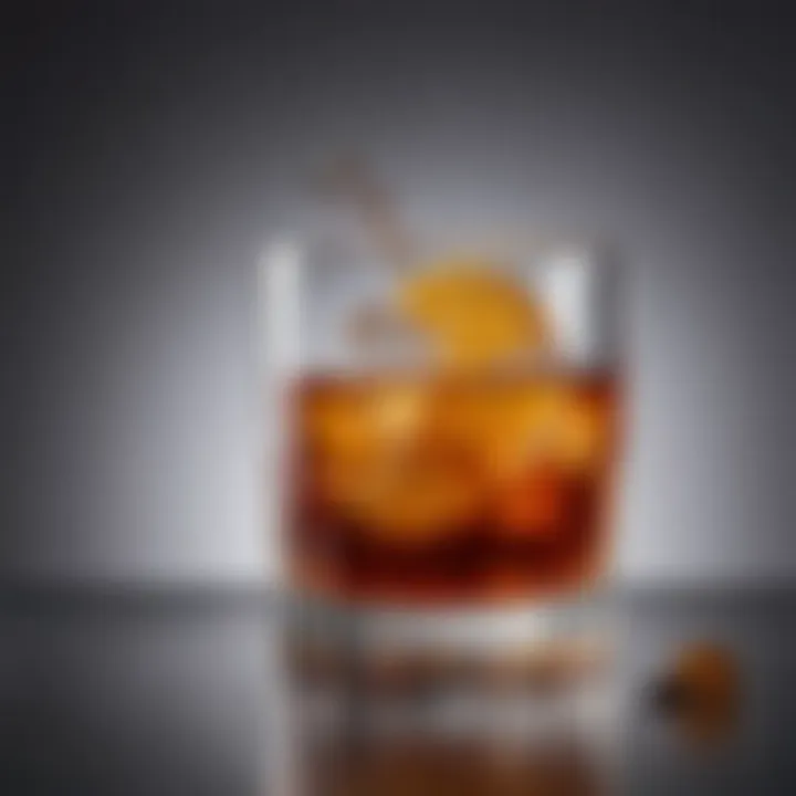 A sophisticated glass of Old Fashioned with a clear background