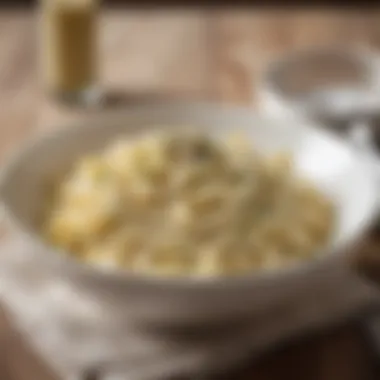 Bowl of Fettuccine Alfredo Delight A bowl of fettuccine alfredo with a sprinkle of black pepper on top