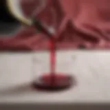 Close-up of red wine stain on a luxurious tablecloth