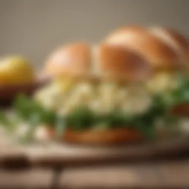 Elegant Presentation of Egg Salad Sandwich An elegantly presented egg salad sandwich with artisan bread and fresh greens
