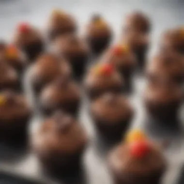 A variety of chocolate cupcakes displayed elegantly on a platter