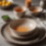 Elegant organic ceramic dinnerware set featuring earthy tones and textures