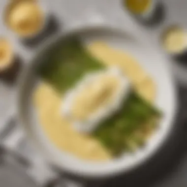 Hollandays Sauce on Asparagus A bowl of velvety Hollandays sauce drizzled over asparagus