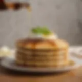 A close-up view of a golden pancake drizzled with stevia sweetened syrup