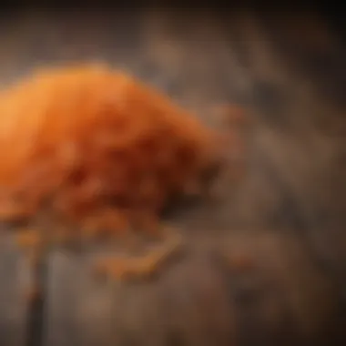 The Essence of Saffron: Vibrant Strands Rich strands of saffron on a wooden surface