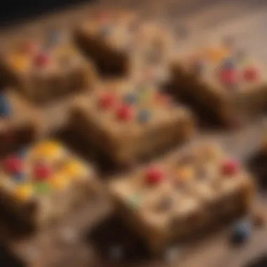 A variety of colorful, sugar-free breakfast bars displayed on a wooden table.