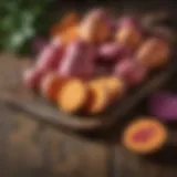 An array of vibrant sweet potatoes of different varieties on a rustic wooden table.