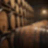 A close-up view of whisky barrels aging in a dimly lit cellar.