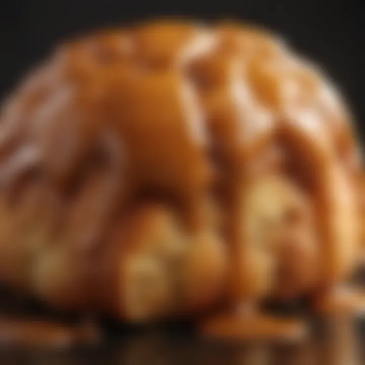 Close-up of gooey caramel drizzled over baked bread