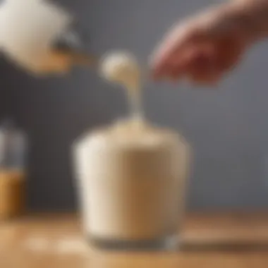 Close-up of a cream whipper in action