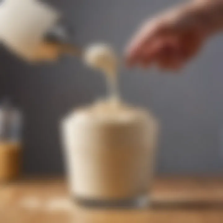 Close-up of a cream whipper in action