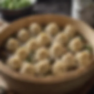 Assorted dumplings arranged neatly in a steamer basket