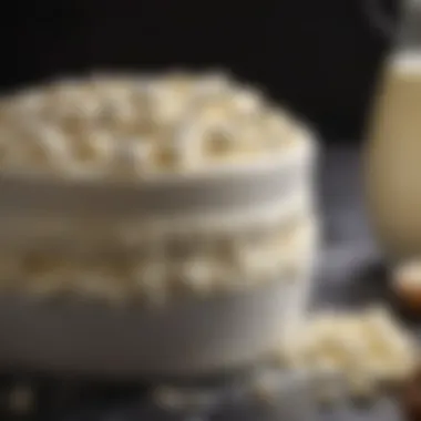 A close-up view of whey being transformed into ricotta cheese.