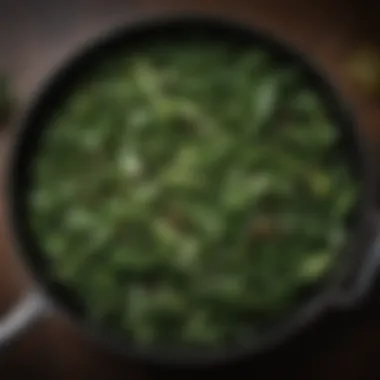 A close-up of sautéed greens glistening in a pan, accentuated by aromatic herbs and spices.