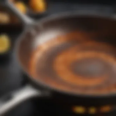 A close-up view of the intricate design detailing on a Pioneer Woman frying pan.
