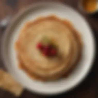 A beautifully plated matzo meal pancake dish, artistically arranged for presentation.