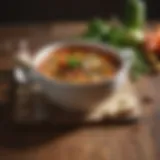 A vibrant bowl of vegetable soup showcasing fresh ingredients.