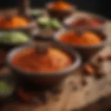 A colorful array of tandoor spices arranged on a wooden table