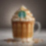 A close-up of caramel drizzle on a frothy Starbucks coffee