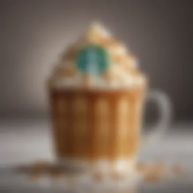 A close-up of caramel drizzle on a frothy Starbucks coffee