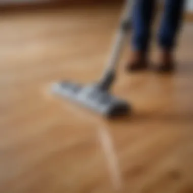 Demonstrating effective vacuuming techniques on hardwood floors