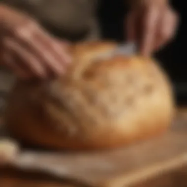 Demonstration of scoring technique on a loaf of dough