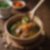 A close-up view of traditional miso paste on a wooden spoon