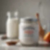 Baking soda in a glass jar with a scoop beside it