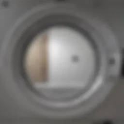 Dryer door open showcasing interior drum