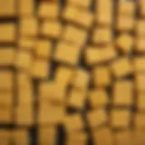 A detailed view of American cheese slices and blocks showcasing its texture.