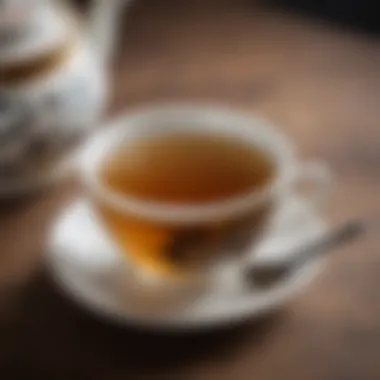 A close-up view of brewed oolong tea in a traditional teacup