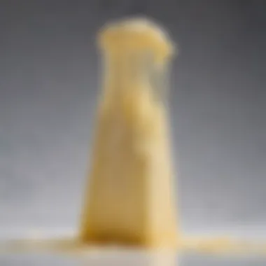The Unique Texture of Vegan String Cheese Close-up of the texture of vegan string cheese, highlighting its stretchiness.