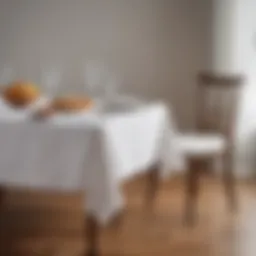 Elegant white stain resistant tablecloth set on a dining table
