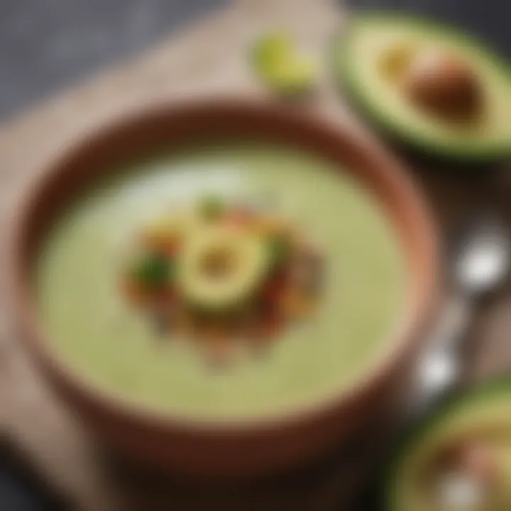 A bowl of creamy avocado soup garnished with seeds